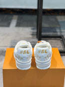 Tênis LV Trainer Dourado